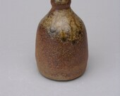 Small stoneware vase with reduced ash
