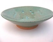 Wheel-thrown bowl on speckled stoneware in aqua / mint / teal blue-green glaze