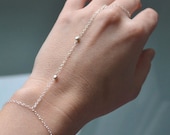 Silver chain slave bracel...