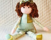Eco-friendly cloth doll, has bamboo yarn hair, has a soft green print body