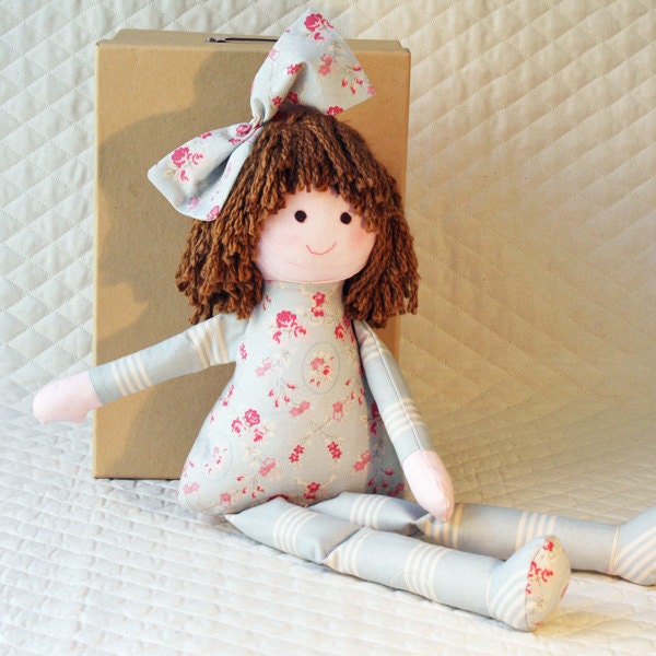 Personalize this clothdoll, she has bamboo yarn hair, has a soft blue print body