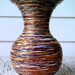 Decorative Large Vase -- White Vase, with Intricate Multicolored Swirl Around Design, Embossed design