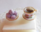 Coffee & Macarons - porcelain coffee cup and saucer and many lavander french macarons