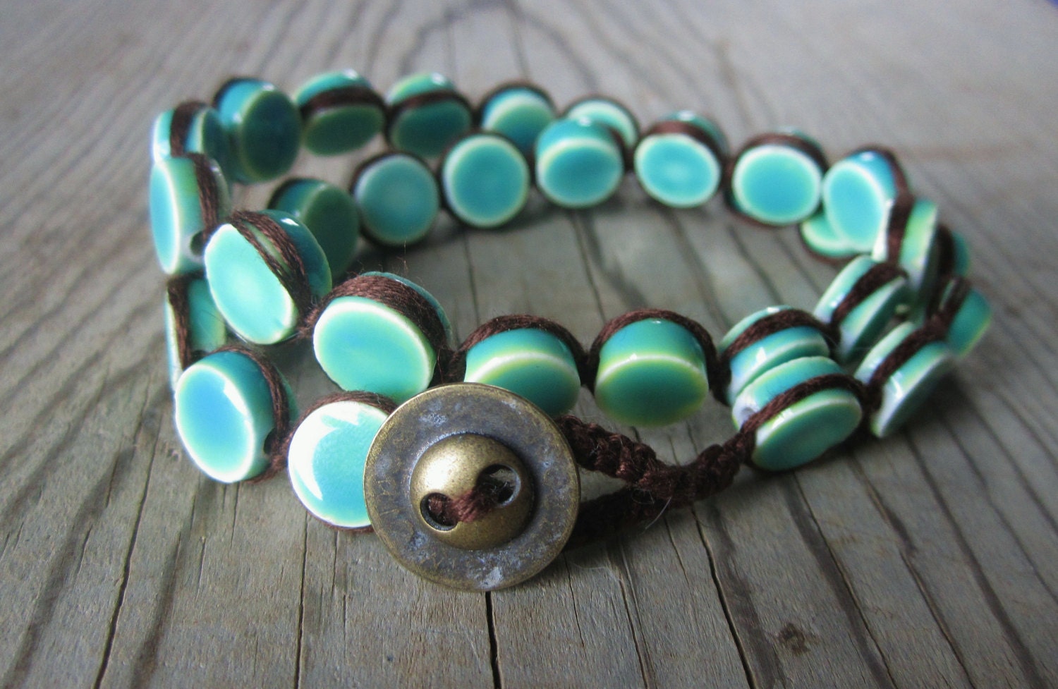 Boho wrap bracelet- teal glazed beads in brown macrame with a brassy button