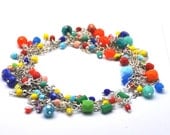 Joyful necklace made with multicolor Faceted Czech glass beads, and a delicate silver toned brass chain made with hearts