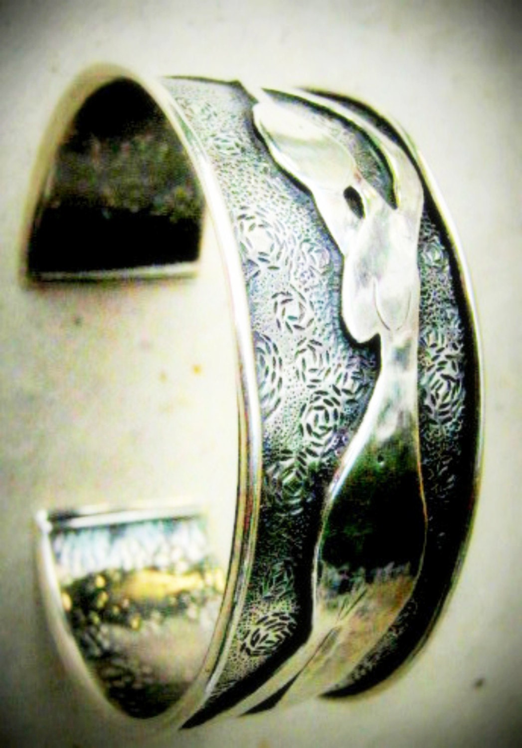 Hand Crafted Sterling Silver Cuff with Pierced and Soldered Dancing Woman and Chased design in the Background