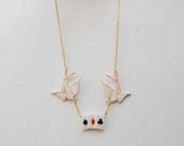 Swallow and playing card necklace. Hand drawn. Hand made.