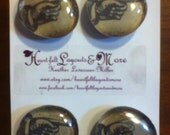 set of four Glass magnets with pointer finger.