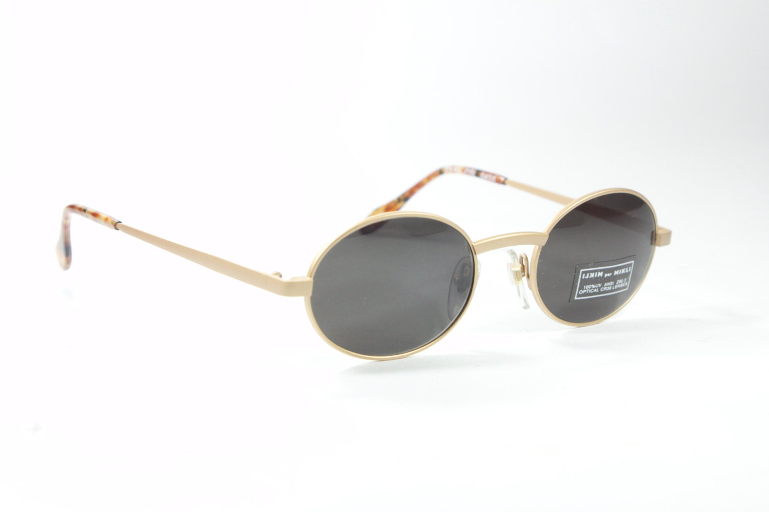 Vintage 80s Alain Mikli Matte gold oval sunglasses, new and unworn 1980s deadstock.