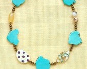 Pieces of the sky Large asymmetric turquoise magnesit fancy necklace with handmade artisan lampwork glass beads and bronze metal findings