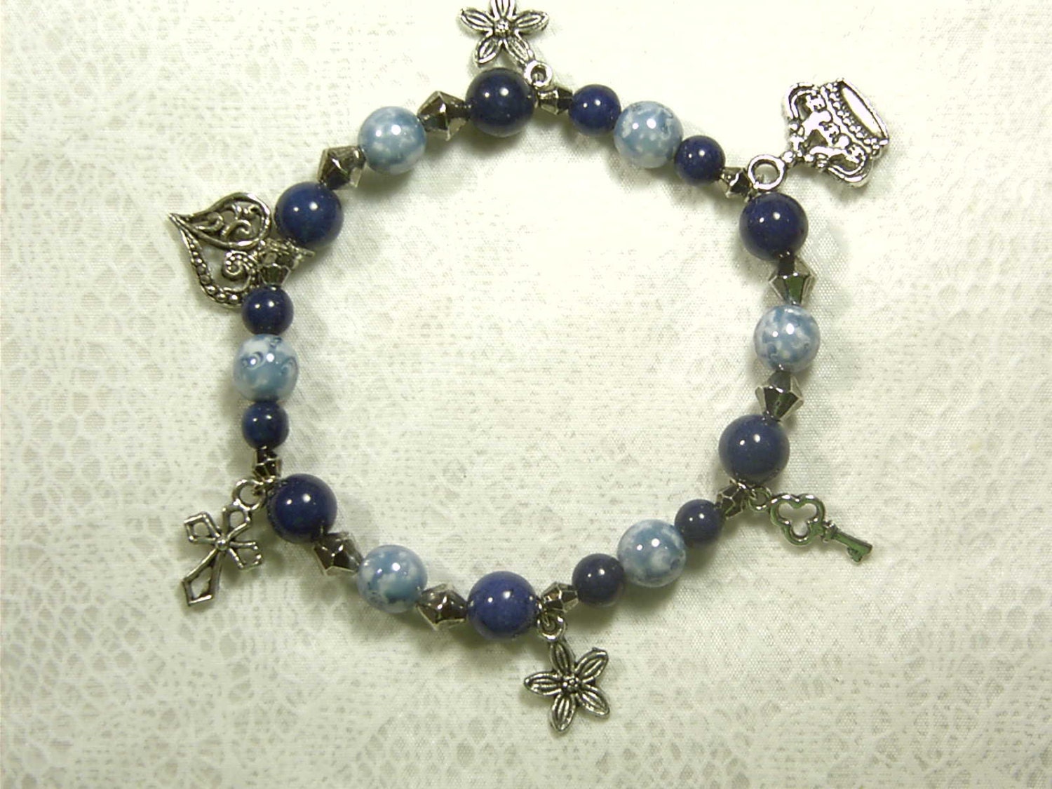 Cynthia Lynn Egyptian Lazuli Lapis BLUE Bead & Glass Bead "RESURRECTION" CROSS -Stretch Charm Bracelet - 6.5-7.5 inches