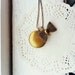 miss coco round bow tie locket pendant necklace