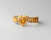 Heart Bracelet. 1940s Expansion. Amber Glass. Co Star. Harwood.