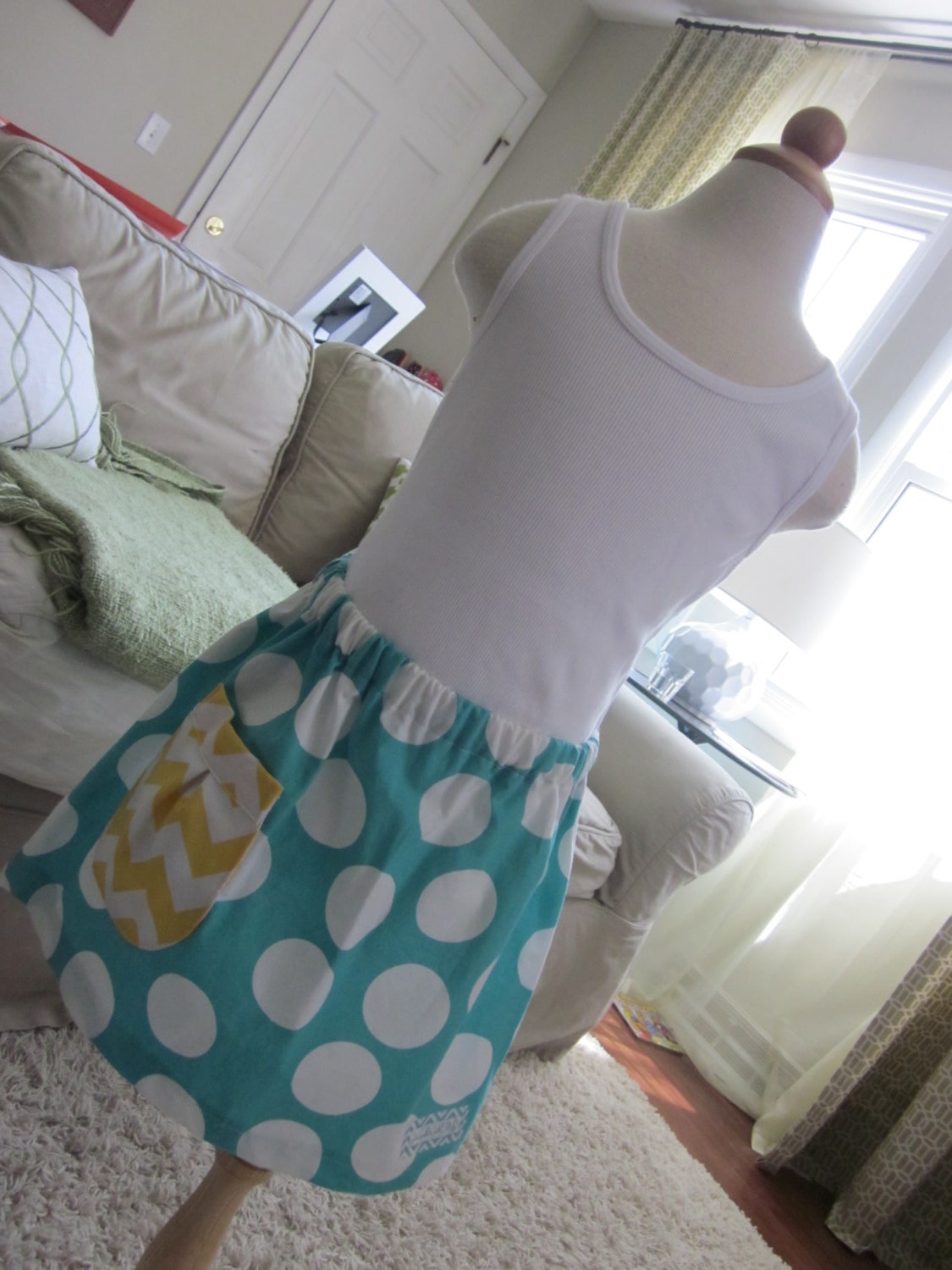 Aqua skirth with yellow chevron pocket