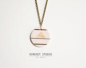 Geometric necklace white & oranget inspired by Scandinavian design completely handmade. Ceramic jewelry by Viruset Studio