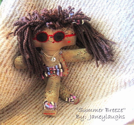 Cloth doll with sunglasses