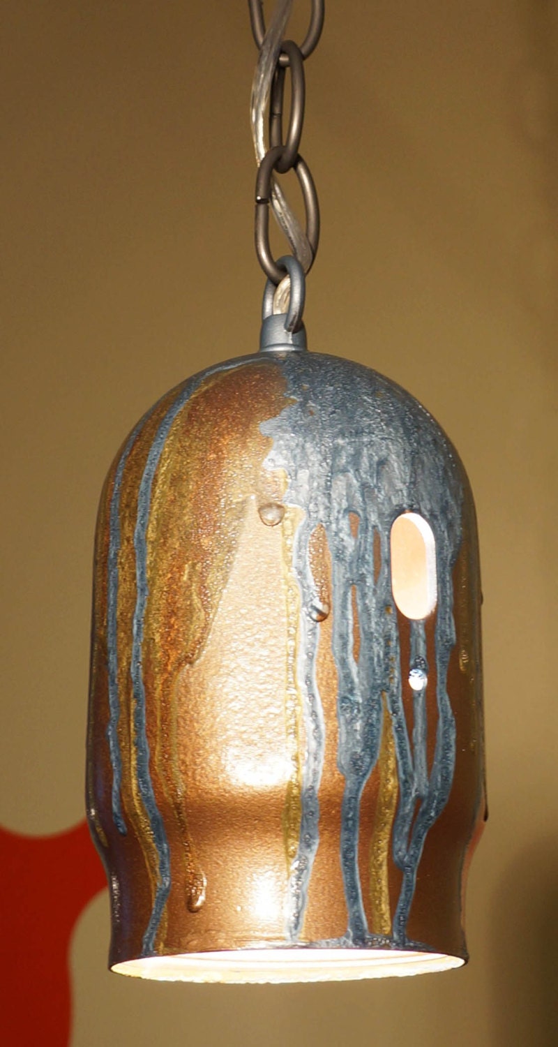 Gold pendant lamp, accent lighting, gold, copper and blue hanging light.