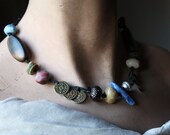Matisse Blue, an Artisan Bead Necklace in bone, wood, stoneware, porcelain, and metal