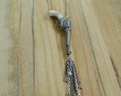 Shooting Stars necklace - vintage toy gun and star charms