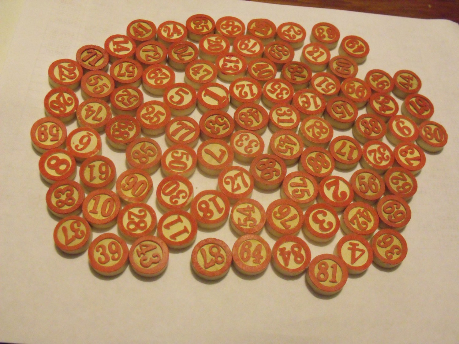 Destash of wooden bingo game pieces