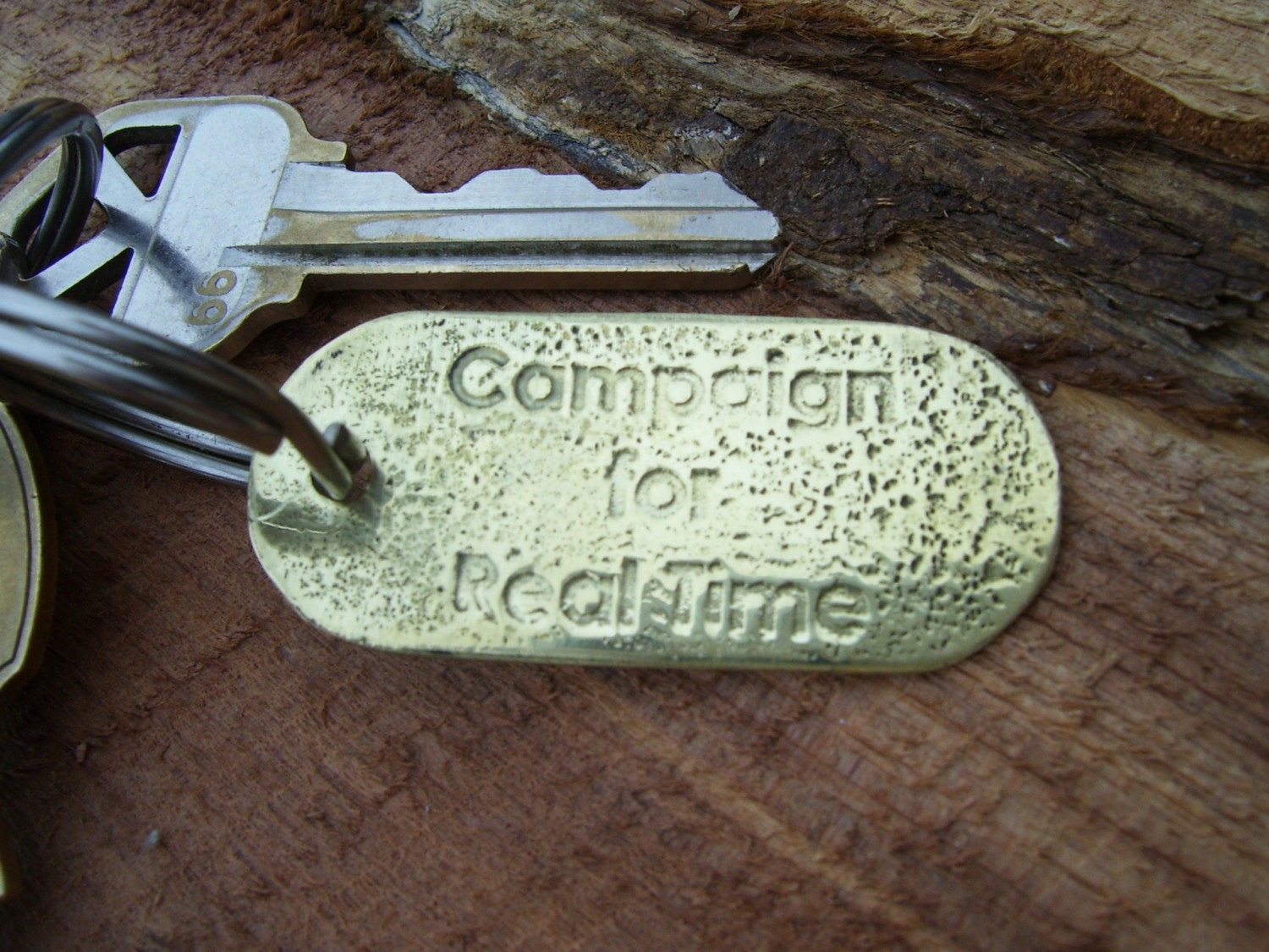 Campaign for Real Time Brass keychain
