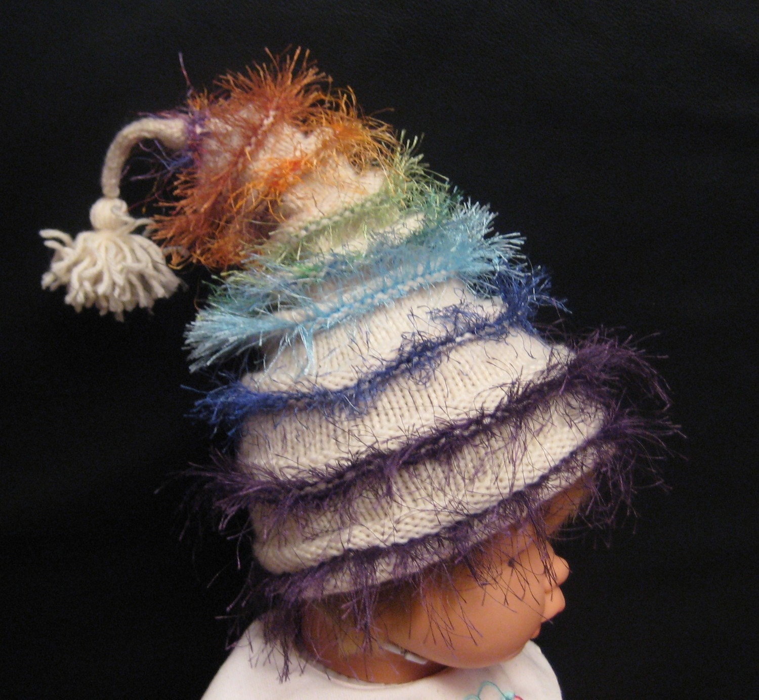 Funky handmade knit Rainbow Stacked Baby beanie hat with tassel