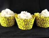 Caution Tape Cupcake Wrappers for Construction themed birthday party