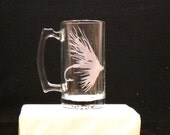 beer stein with fishing fly lure etched on it