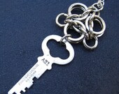 Biohazard Pendant w Key