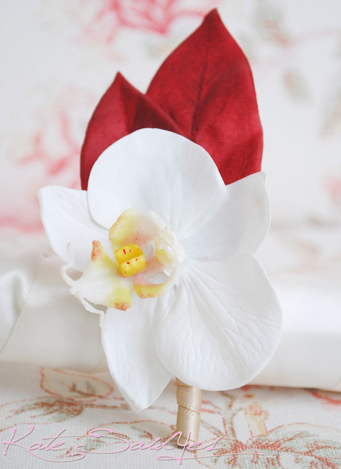 White and Red Orchid Boutonniere