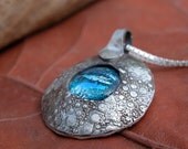 fine silver sea urchin pendant with dichroic glass