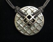 urban artifact necklace - silver cage with stampings, washer, shiny gunmetal beads