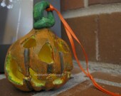Halloween Jack o Lantern Ornament Yellow Glow in the Dark Inside