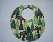 Baby bib, four soft layers, reversible, brown mooses, and green trees.