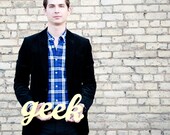geek sign made from recycled wood