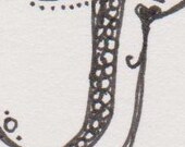 Hand-drawn capital letter J for papercrafting or framing, ink on paper