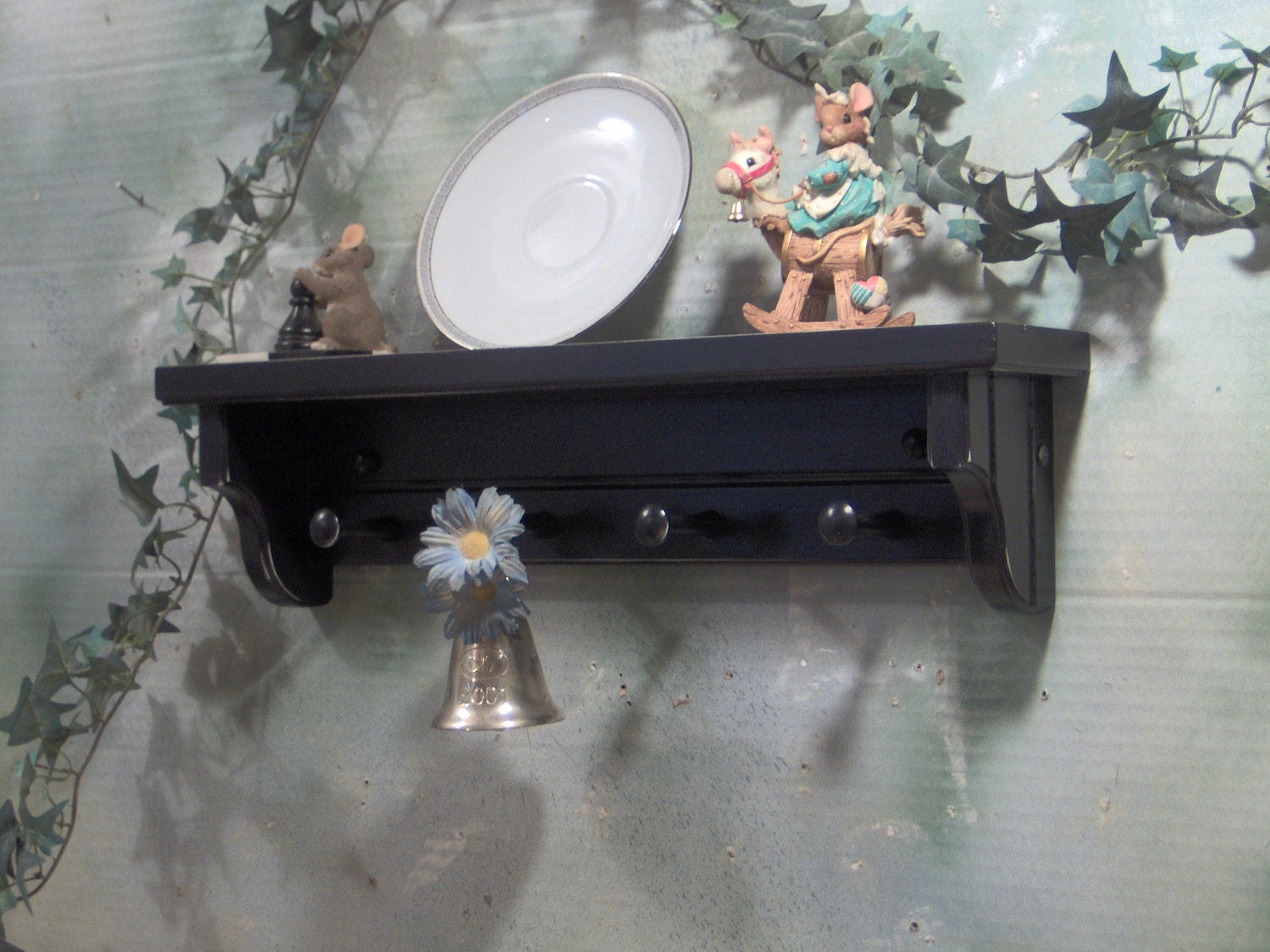 24" Black wooden shelf for knik knack, plates / pegs