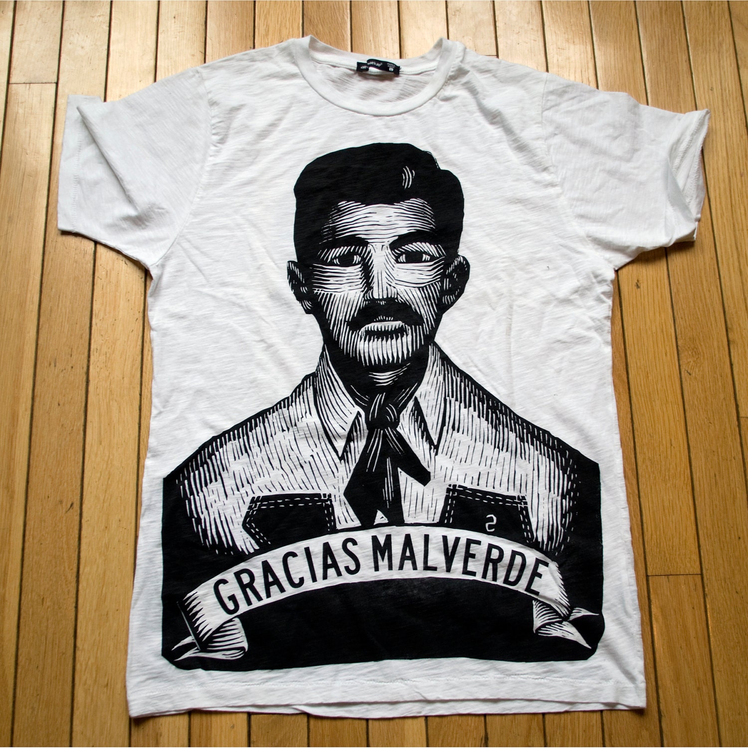 White Tee with black silkscreen image of Jesús Malverde SIZE SMALL