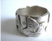 Recycled silver ring with tiny ivy leaves