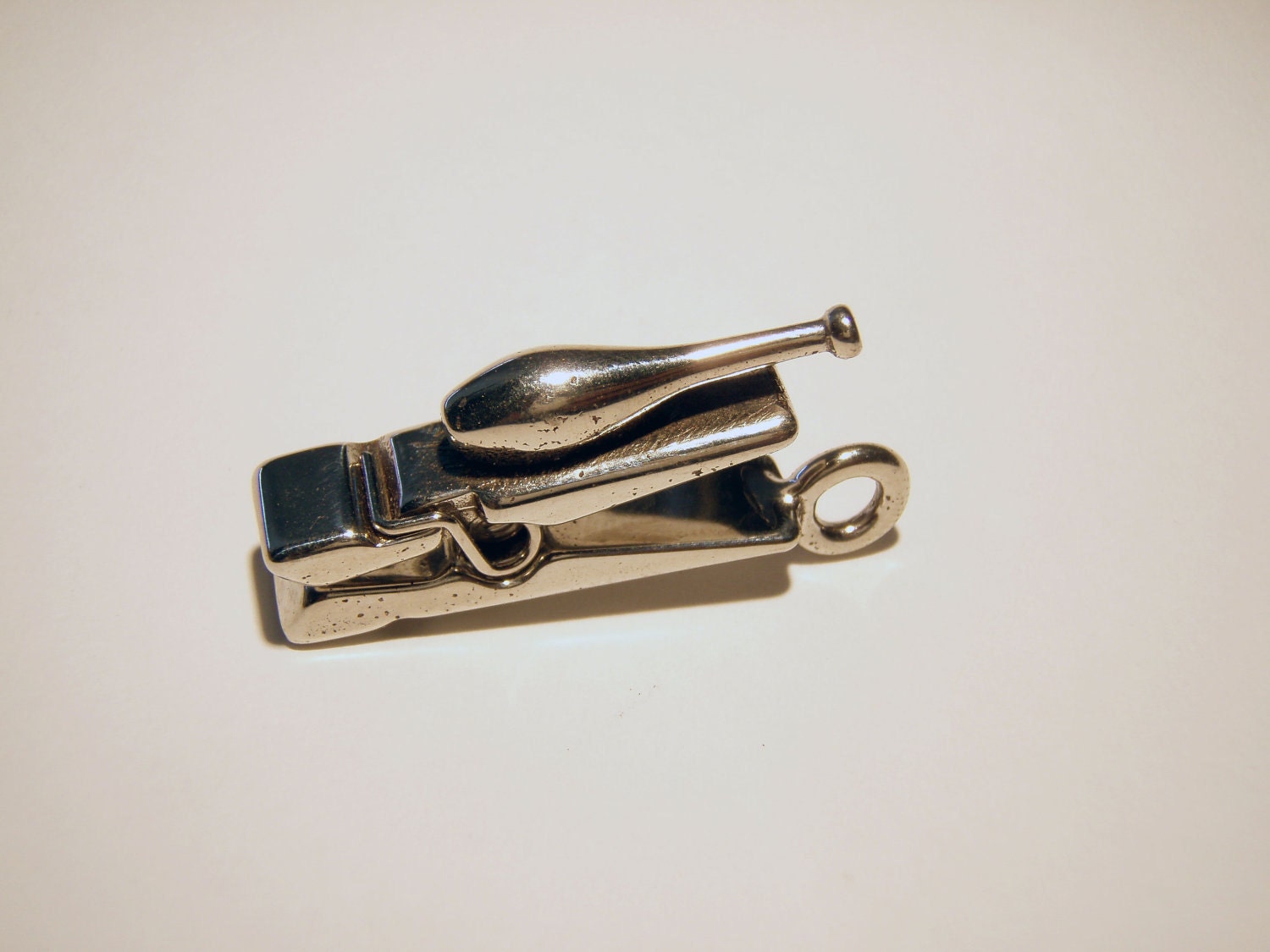 Juggling Peg Pendant (white bronze)