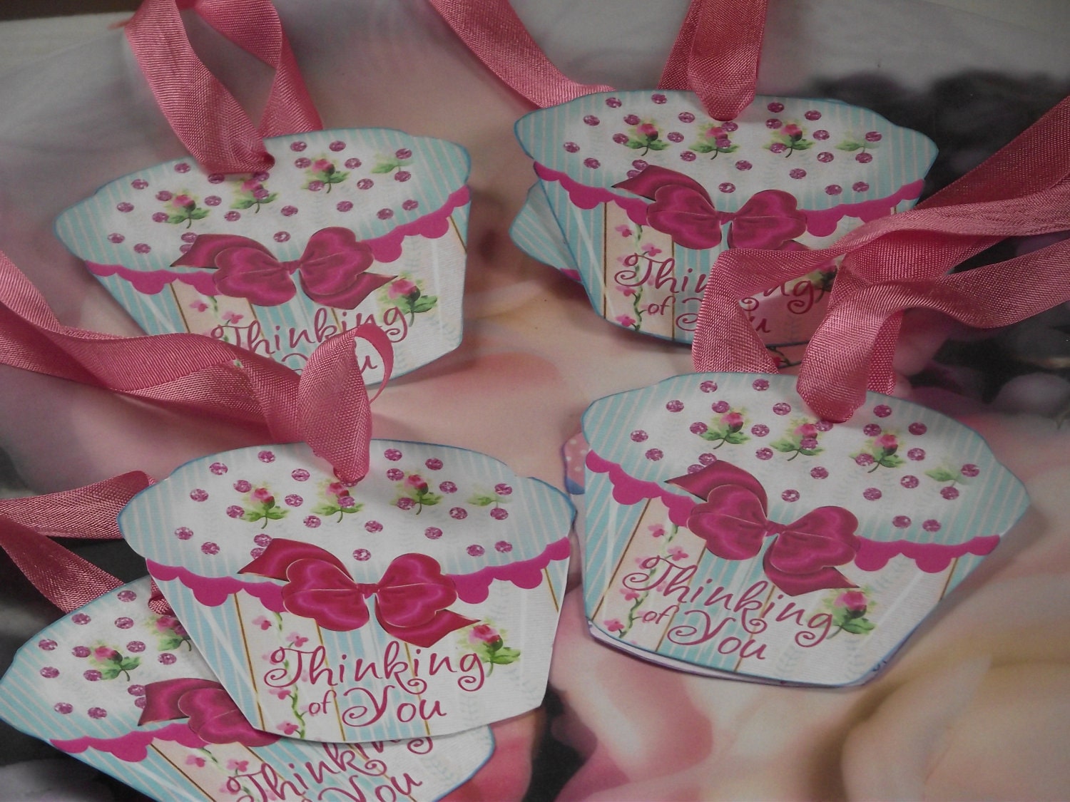 Thinking  Of  You  Cupcake  Gift  Tags  With  Pastel  Blue   colors  and   A   Pink   Bow