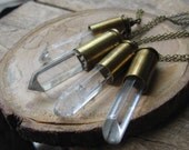 i am illuminated-- single .45 cal bullet and xl quartz necklace