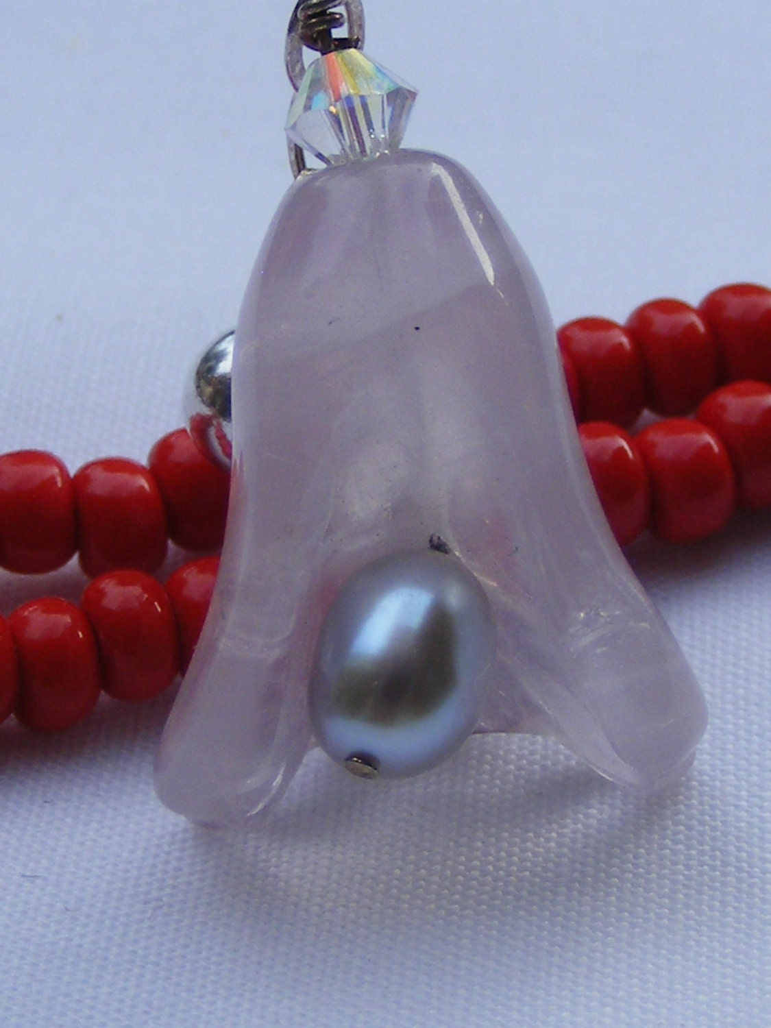 Dangling Earrings . Light Pink . Siver Freshwater Pearls