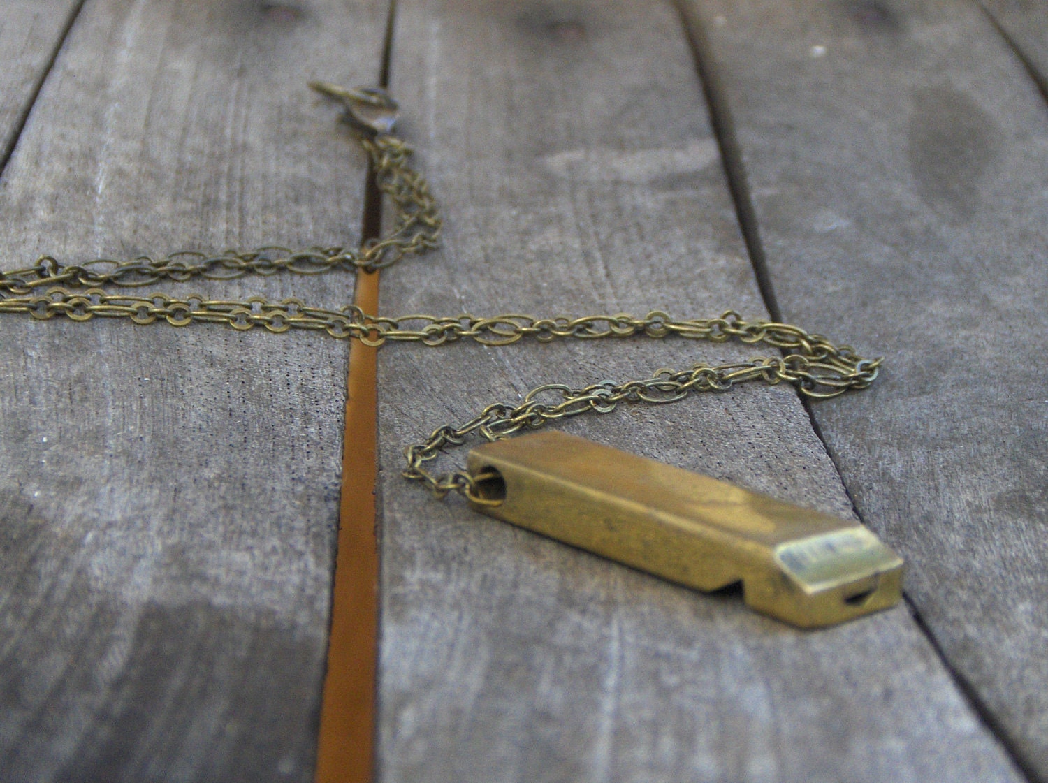 Antique whistle necklace