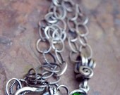 Poison Ivy, Antiqued Sterling Silver and Emerald CZ necklace, ThePurpleLilyDesigns