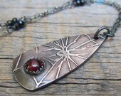 Queen of the Demonweb Pits Necklace III ... Gilded Fine Silver Spiderweb with Red Garnet Bezel