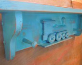 Blue  Wood Train Shelf with Pegs.