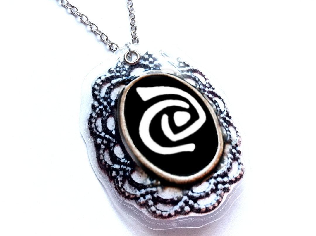 Roswell Necklace, Filigree Pendant with Alien Swirl Symbol