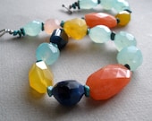 Carnival V - Chunky faceted colorful gemstone necklace in cobalt, aqua, honey yellow, pink and tangerine
