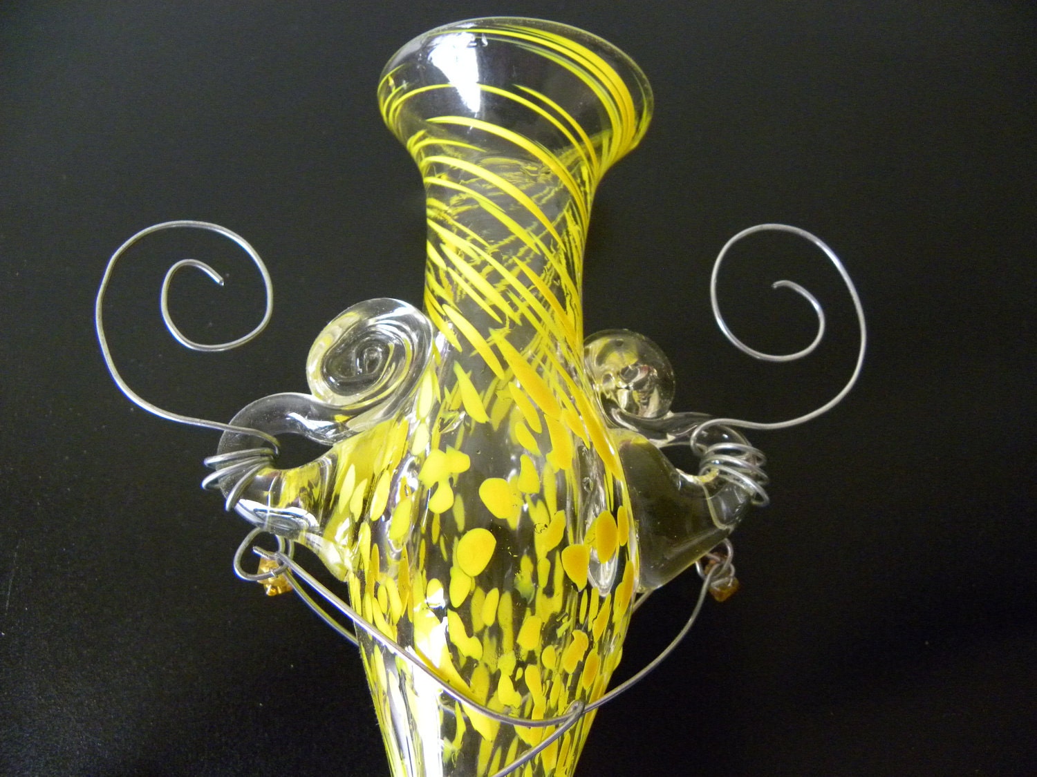 Clear and yellow hand blown hanging glass vase with matching whimsically twisted wire